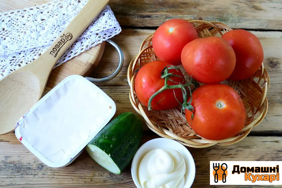 помідори, фаршировані сиром та огірками - фото крок 1