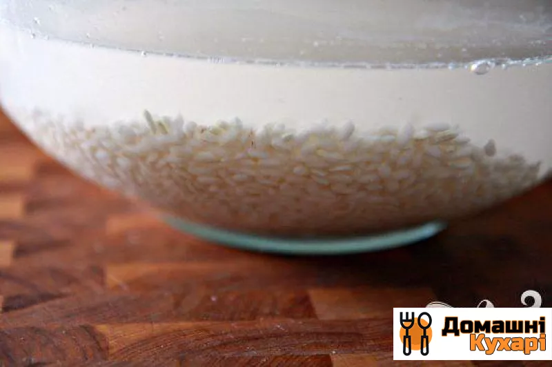 Рисовий десерт з родзинками - фото крок 1